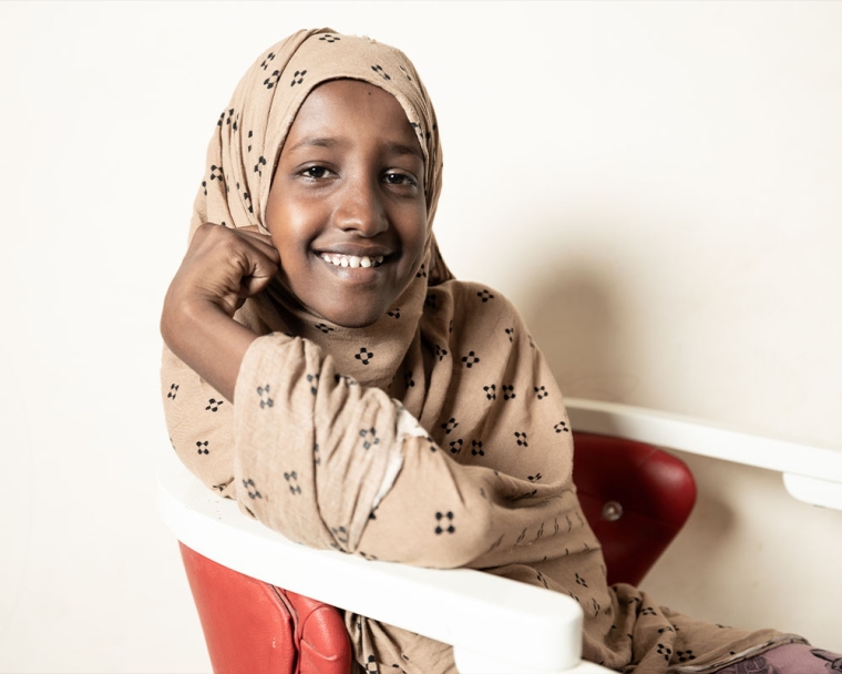 Maryan smiling after cleft surgery