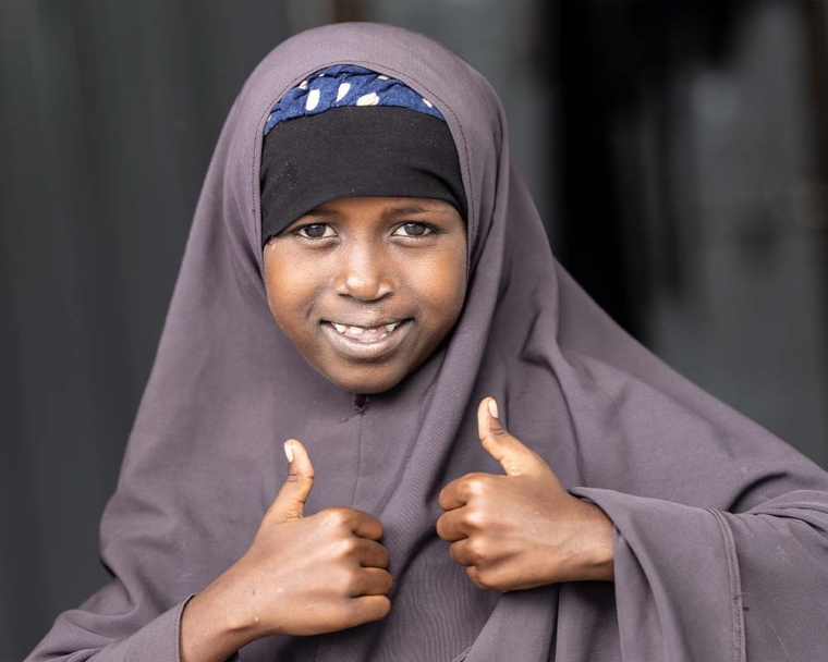 Nasro smiling after cleft surgery