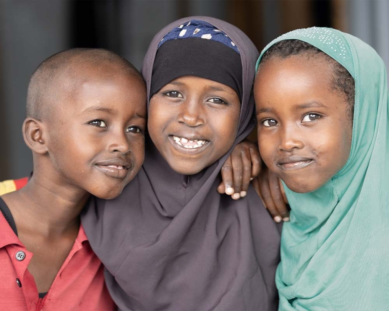 Nasro smiling with her friends after cleft surgery