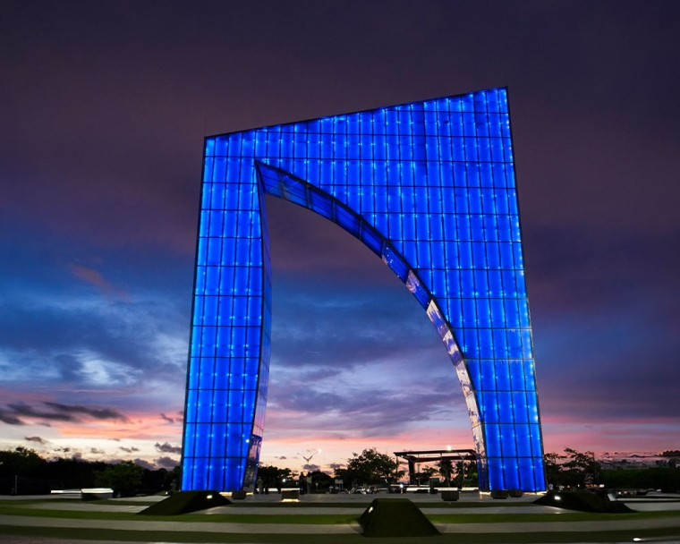 Aleta de Tiburon in Colombia lit blue at twilight