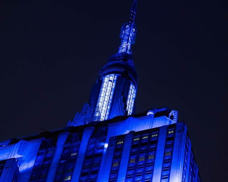 Empire State Building lit up blue for World Smile Day