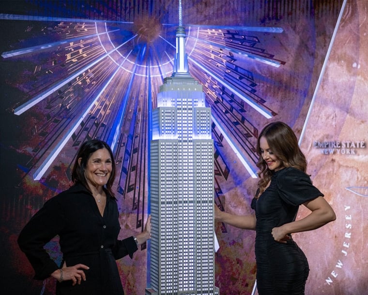 Smile Train CEO and Liz Gillies lighting the Empire State Building