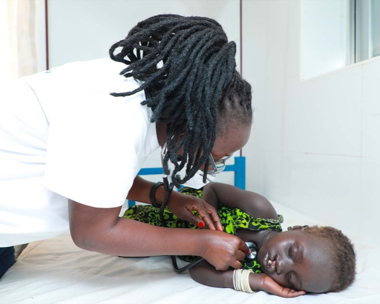 Nyanchiek receiving care at Mary Help Hospital