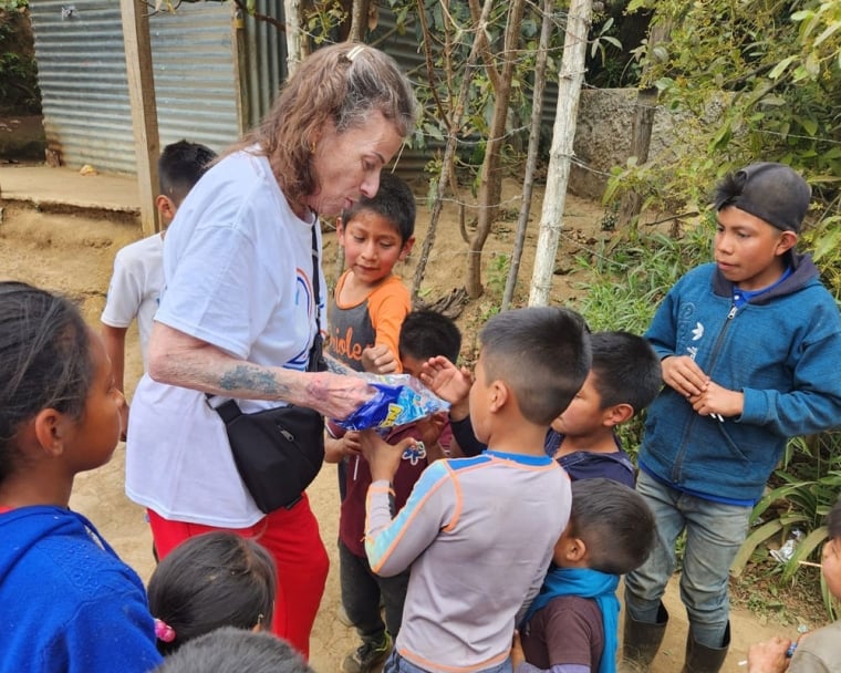 Karen Chambers meeting cleft-affected children