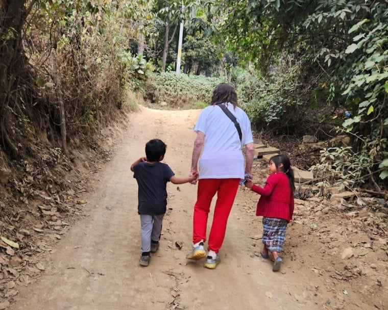 Karen walking with children