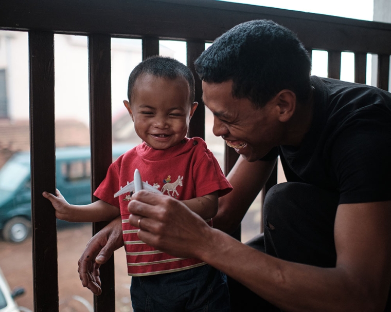 Eden with his father Heriniaina after cleft surgery