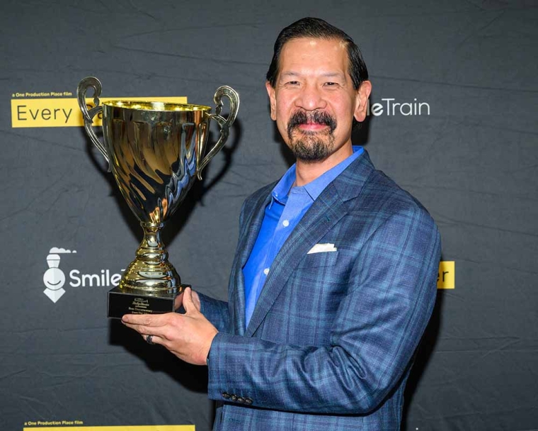 Dave A Liu with trophy
