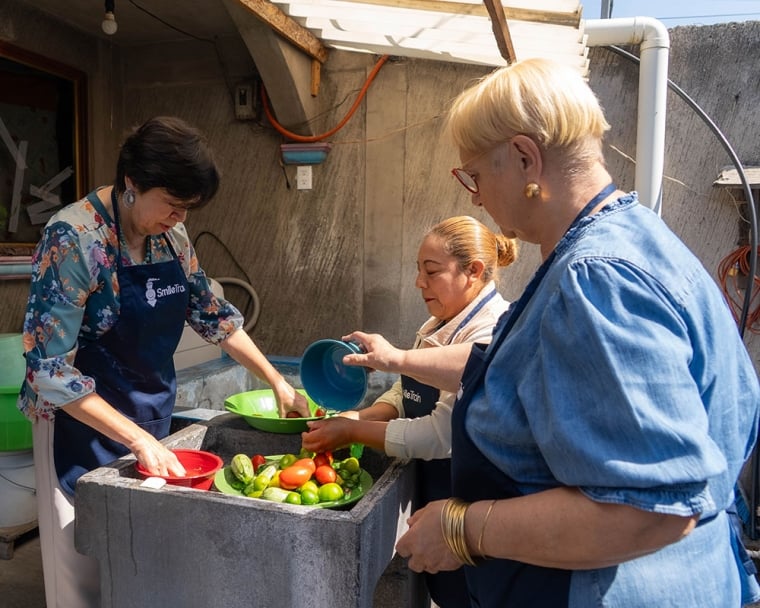 Lidia sorting through tomatoes