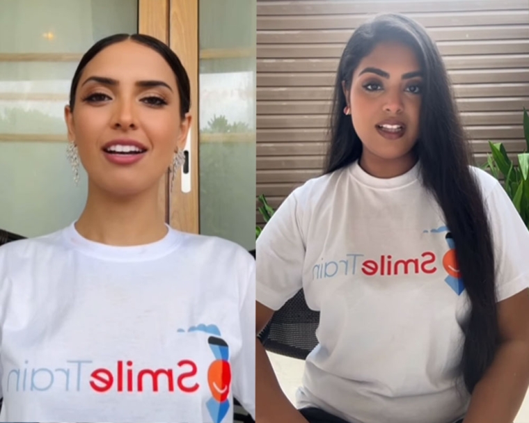 Roma Riaz and Akifa Khattak smiling and wearing Smile Train t-shirts